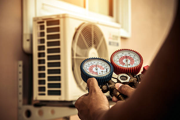 Professional Hvac Repair technician working in Hampton Bays, NY